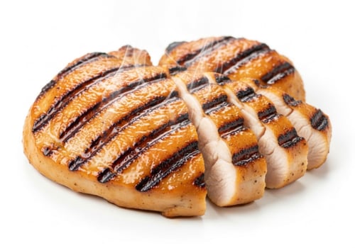 Grilled chicken breast sliced isolated on white background, healthy and delicious meal photo