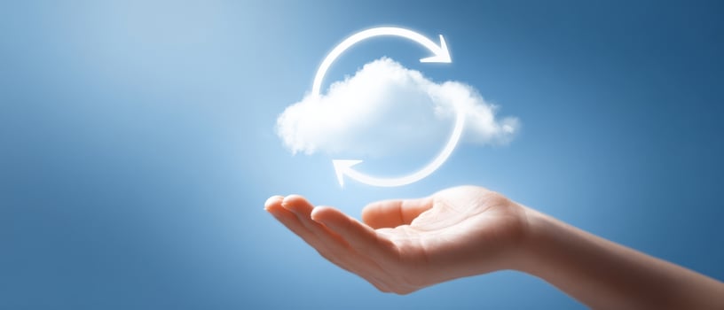 The Hand Holding a Cloud with Circular Arrows Indicating Data Transfer photo