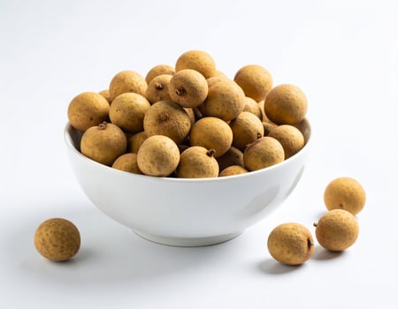 Fresh Longan Fruit in White Bowl - Sweet and Juicy Tropical Delight photo