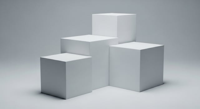 Four white geometric cubes arranged on a light gray background shape object photo