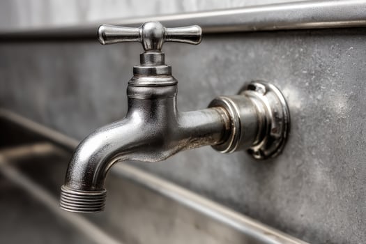 Stainless steel emergency eyewash station designed for immediate safety in hazardous work environments photo
