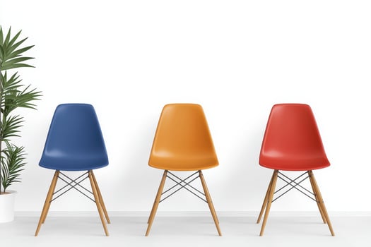 Colorful chairs in modern office setting with plants photo