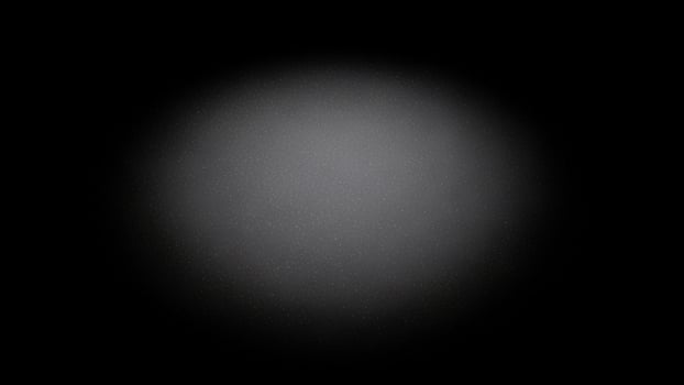 A black background with a white light in the center photo