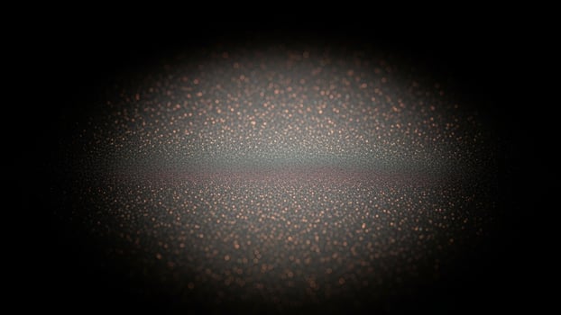 A dark background with a light source in the center photo