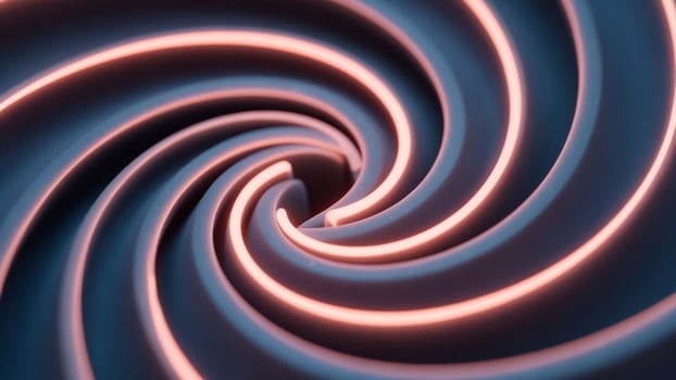A spiral with pink and blue lights photo