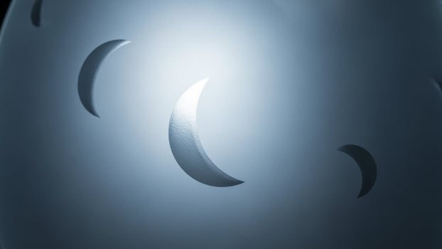 A blue egg with a moon on it photo