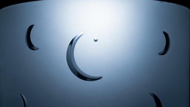 A metal cylinder with a smiley face on it photo