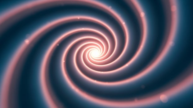 A spiral with a bright blue and pink background photo