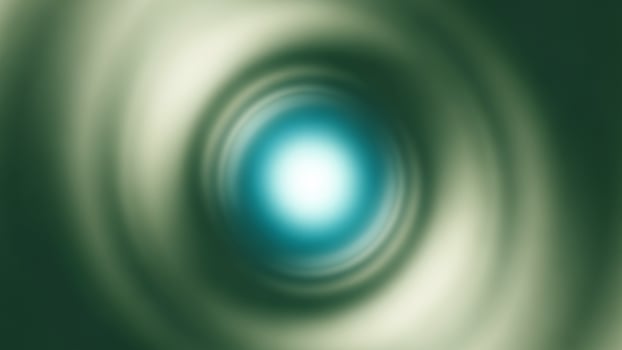 A green and blue swirl with a bright light photo
