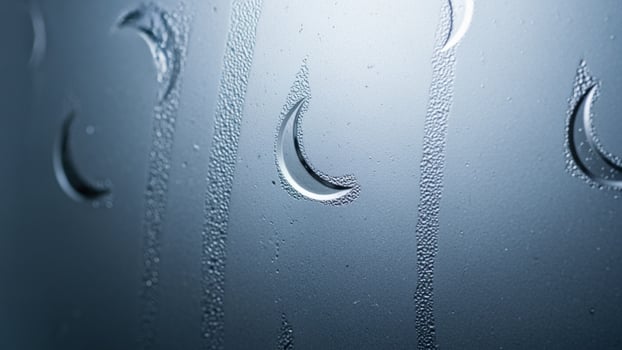Water drops on a glass window photo