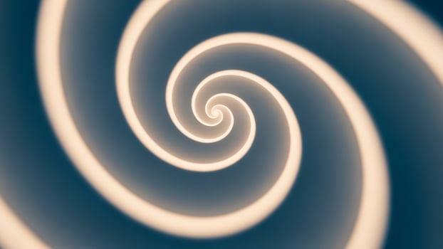 A spiral is shown in a blue and white background photo