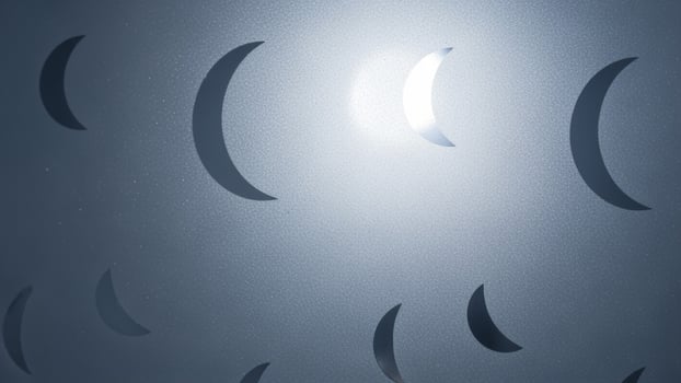 A photo of a wall with many crescent shaped holes