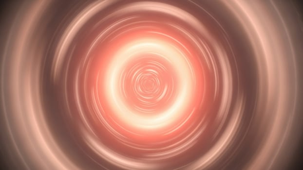 A red and orange swirl in the dark photo