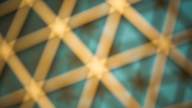 Abstract background of a blue and gold geometric pattern photo