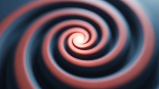 A red and blue spiral is shown in the background photo