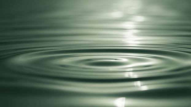 Water ripple with light reflection photo