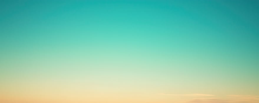 Soft gradient sky with calm blue and warm orange tones creating peaceful atmosphere photo