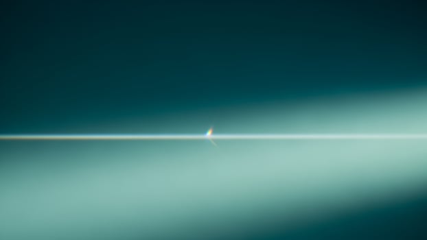 A light beam is shining on a dark surface photo