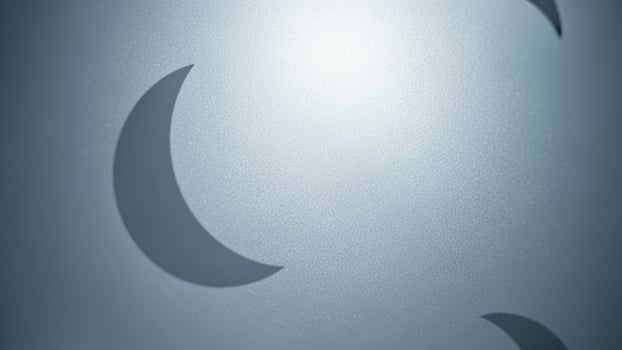 A metal wall with a crescent moon on it photo