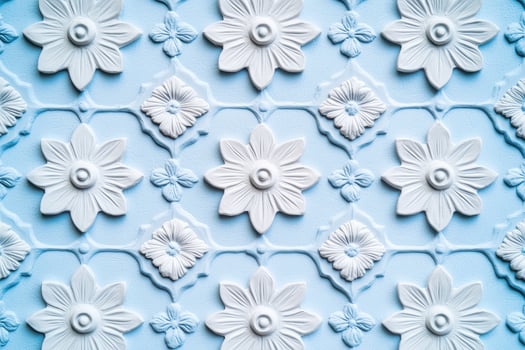 White floral pattern on subtle light blue textured wall creates elegant decorative design photo