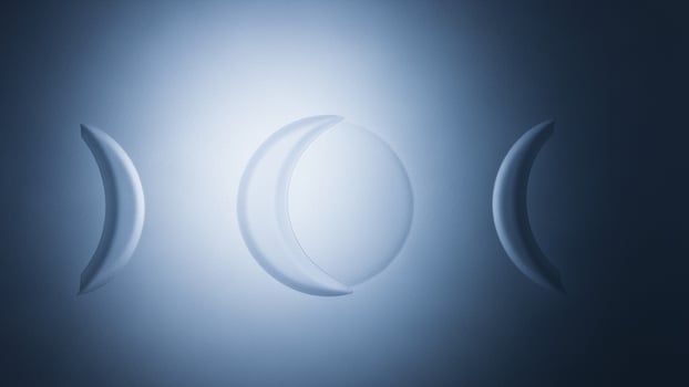 Three moon phases on a dark background photo