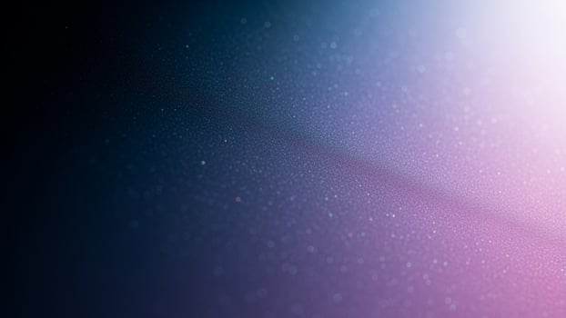A purple and pink background with a blurred image photo