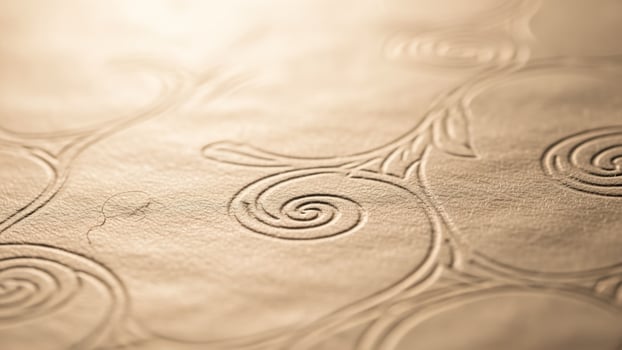 A close up of a pattern on a piece of paper photo