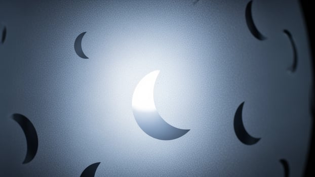 A light is shining through a hole in a wall photo