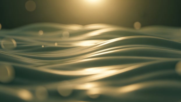 A close up of a wave with the sun shining photo
