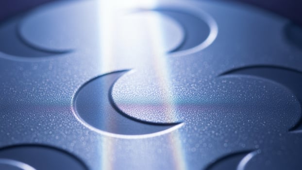A close up of a metal ball with a circle pattern photo