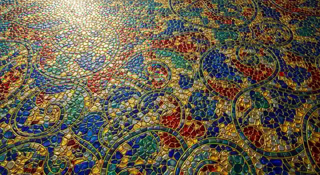 A mosaic floor with gold and blue designs photo
