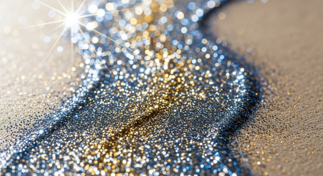 Sparkling Blue and Gold Glitter Trail with Starburst Light Effect photo