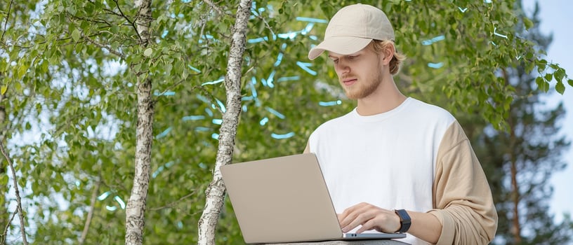Remote working digital nomad outdoor with laptop computer photo