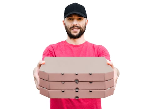 Smiling pizza delivery man holds pizza boxes isolated on white background. Mockup. Delivery service. Selective focus. photo