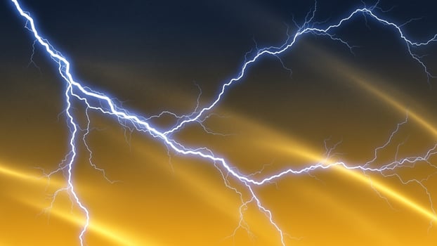 A lightning bolt is striking through the sky photo