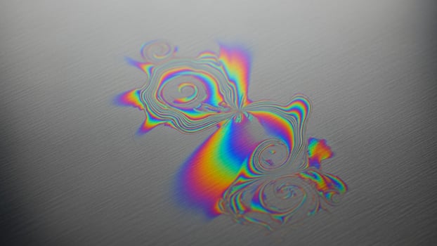 A colorful abstract design on a metal surface photo