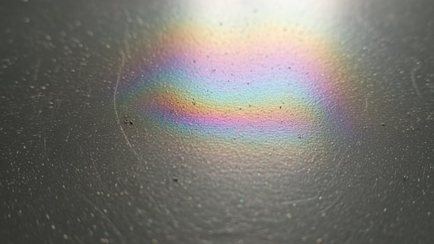 A rainbow is reflected in a mirror photo
