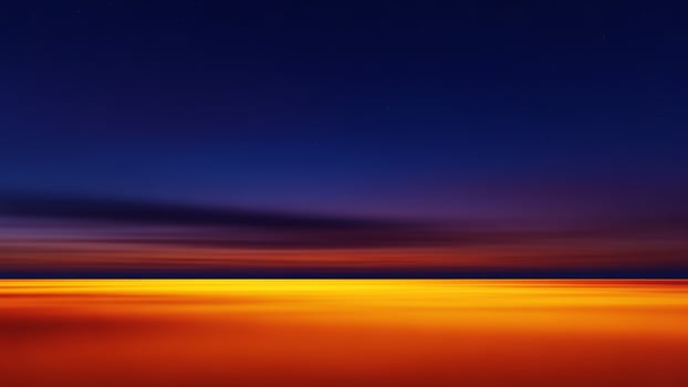 An abstract photograph of a sunset over the ocean photo