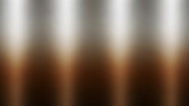 A blurry image of a metal wall with a few different colors photo