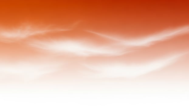 A white cloud is in the sky with orange clouds photo