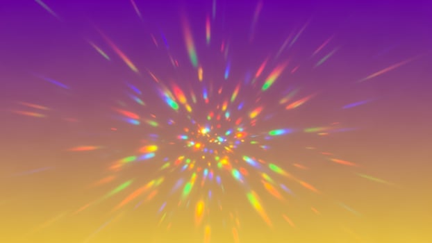 A colorful burst of light is shown in the sky photo