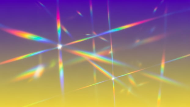 A rainbow colored background with many bright spots photo
