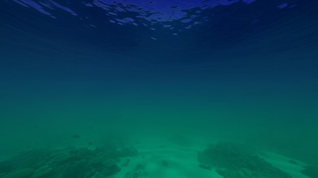 Underwater scene with a blue ocean and some rocks photo