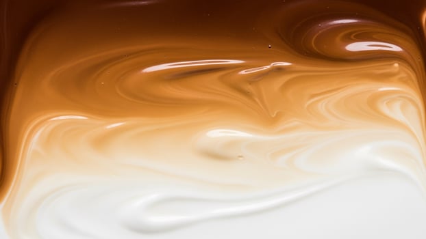 A close up of a white and brown liquid photo
