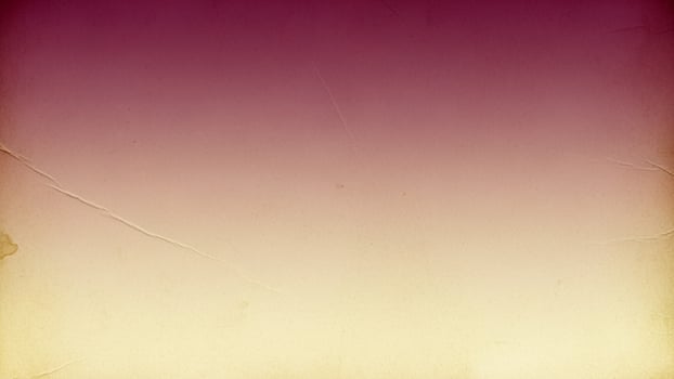 A vintage paper background with a red and yellow gradient photo