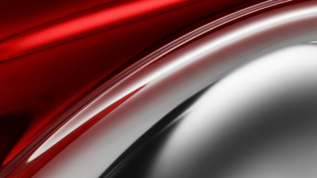 A red and silver car with a curved surface photo