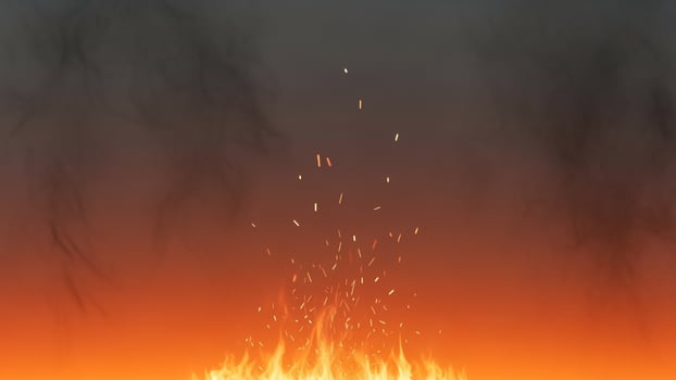 A fire is burning in the air with smoke coming out photo