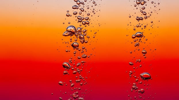 Water bubbles on a red and orange background photo