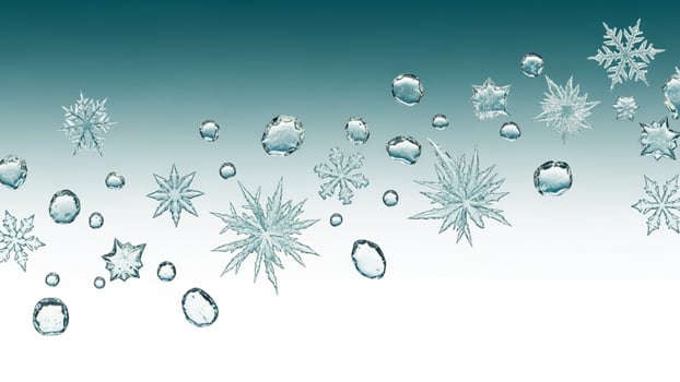Snowflakes are floating in the air on a blue background photo