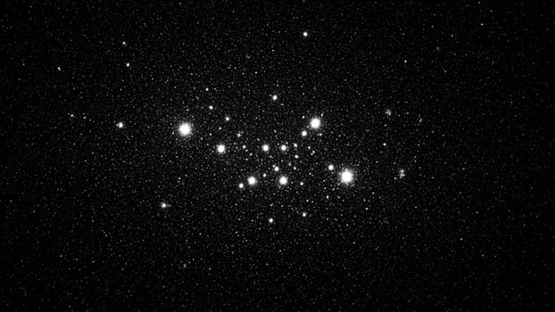 A cluster of stars in the night sky photo
